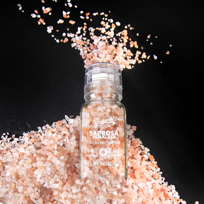 Product shot of a jar of himalayan pink salt